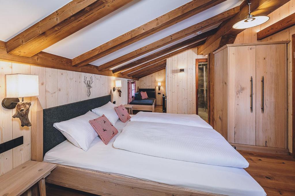 Postel nebo postele na pokoji v ubytování AlpenOase Sonnhof
