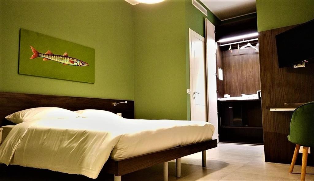 A bed or beds in a room at Casa Consani