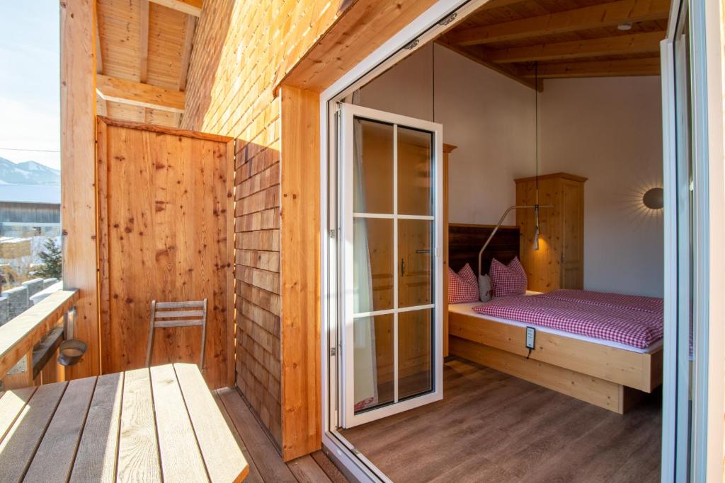 Postel nebo postele na pokoji v ubytování Berggasthof Sonne Allgäu