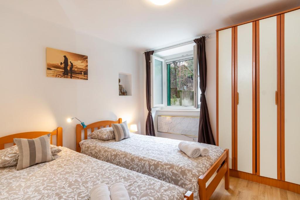 Posteľ alebo postele v izbe v ubytovaní Apartment Spalatin