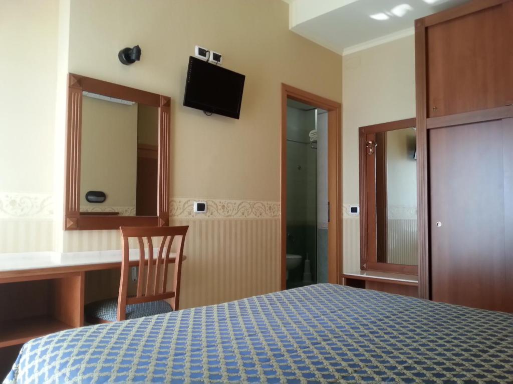 TV a/nebo společenská místnost v ubytování Hotel Grifone