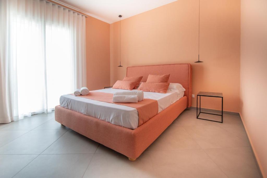 Łóżko lub łóżka w pokoju w obiekcie Casa Angelina