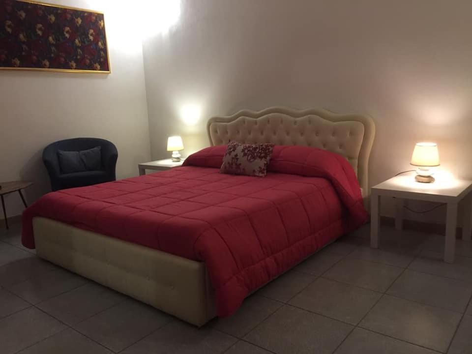 Postel nebo postele na pokoji v ubytování B&B Il Tulipano