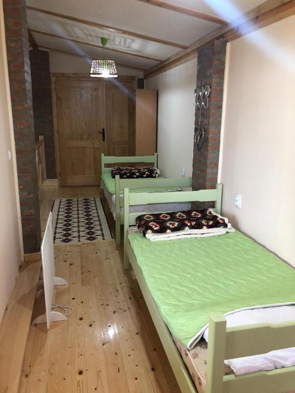 Postel nebo postele na pokoji v ubytování Salaš Gnijezdo