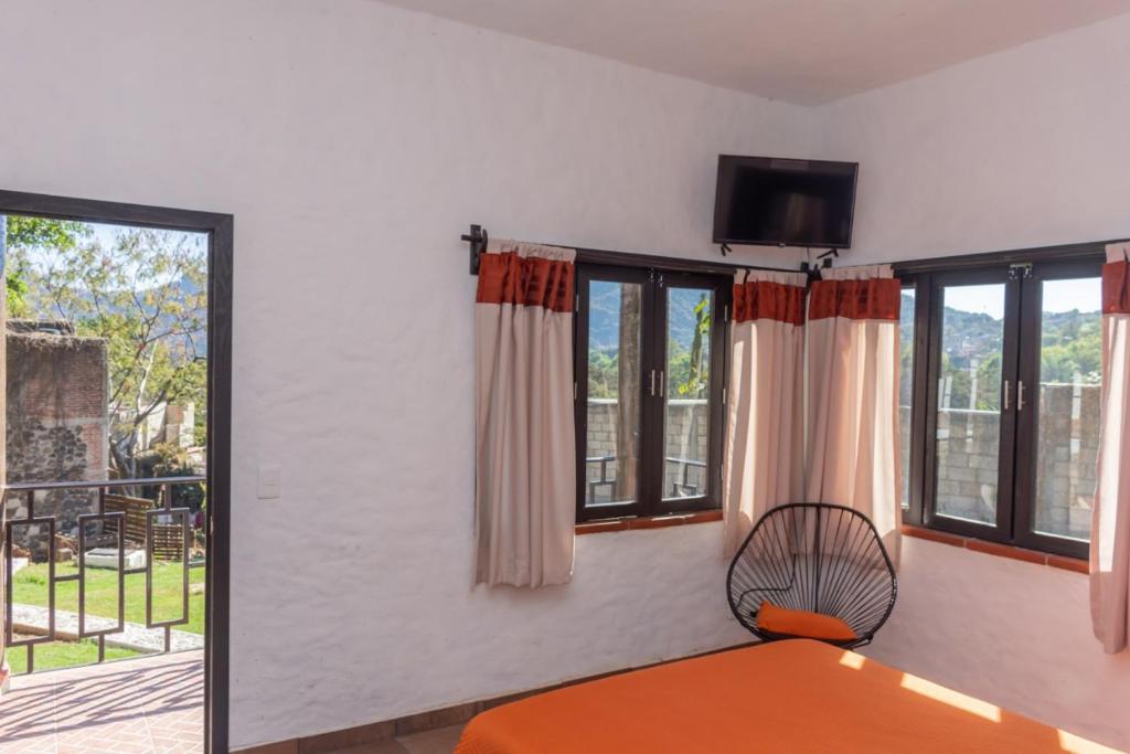 TV o dispositivi per l'intrattenimento presso Hostal Maria Tepozteca