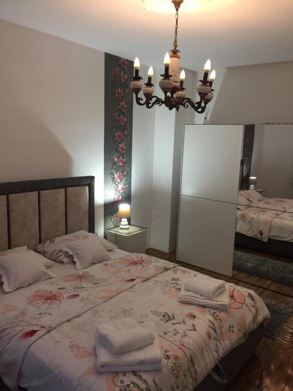 Postel nebo postele na pokoji v ubytování Apartman Hakuna Matata