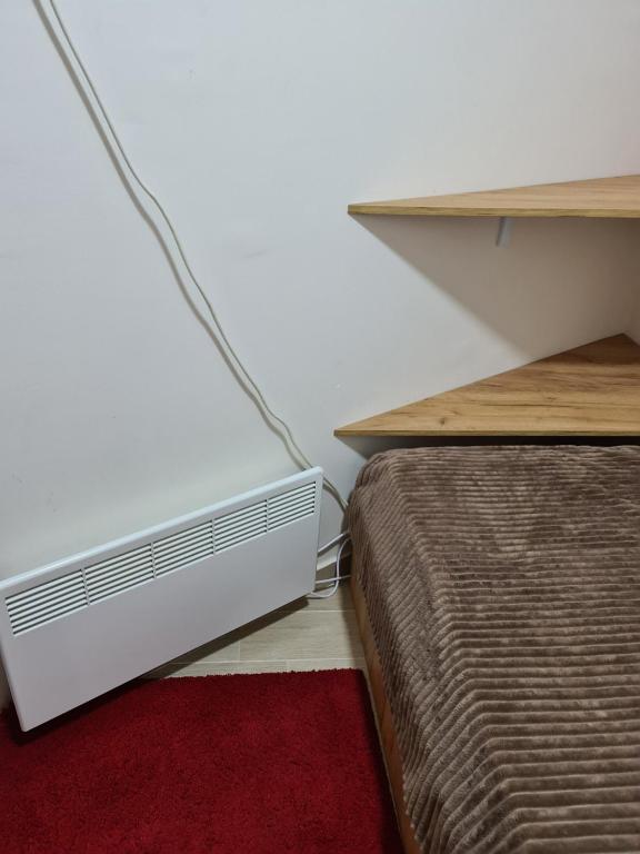 Posteľ alebo postele v izbe v ubytovaní Divcibare apartmani Gavrić