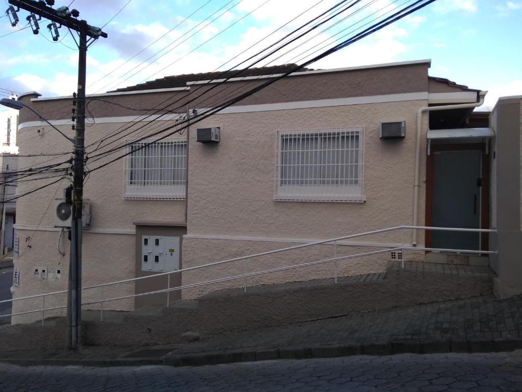 a building with a door on the side of it at Pousada Bonatti in Blumenau