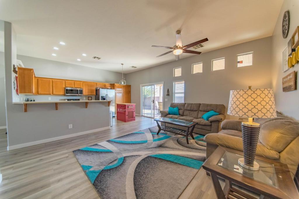 a living room with a couch and a table at Gorgeous Las Vegas home with RV parking in Las Vegas