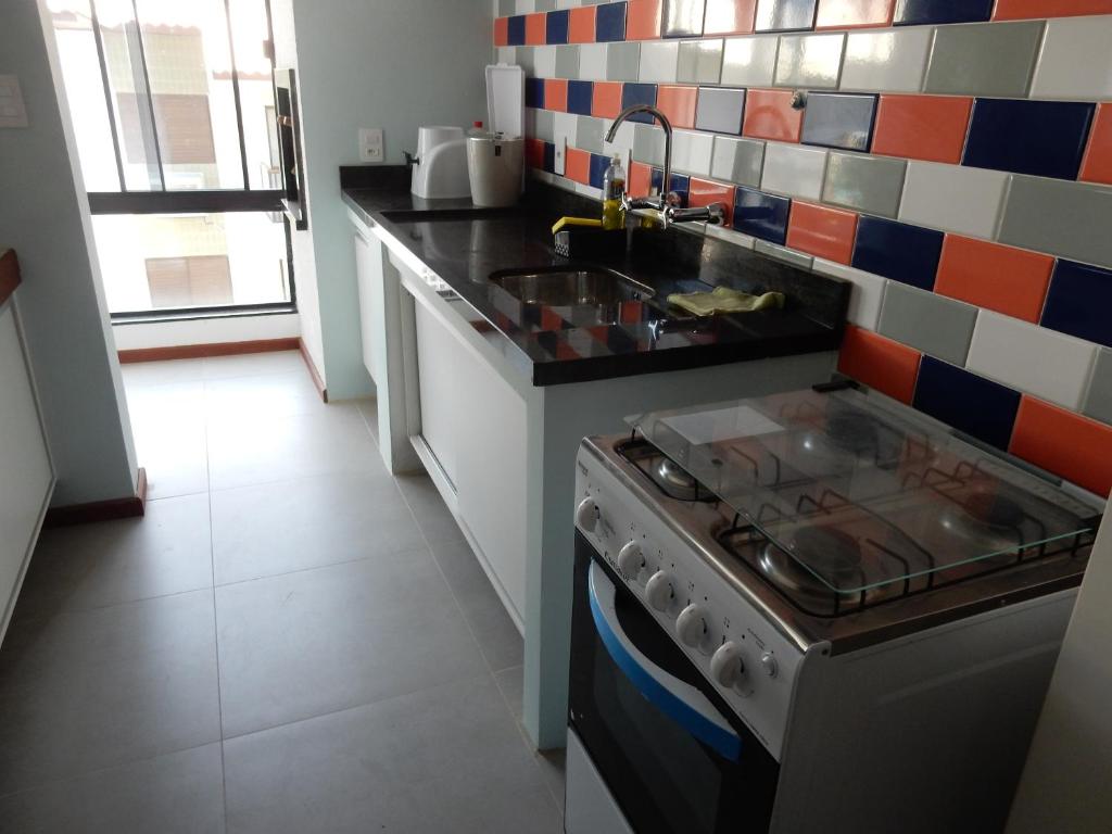  Apartamento - condomínio frente Mar