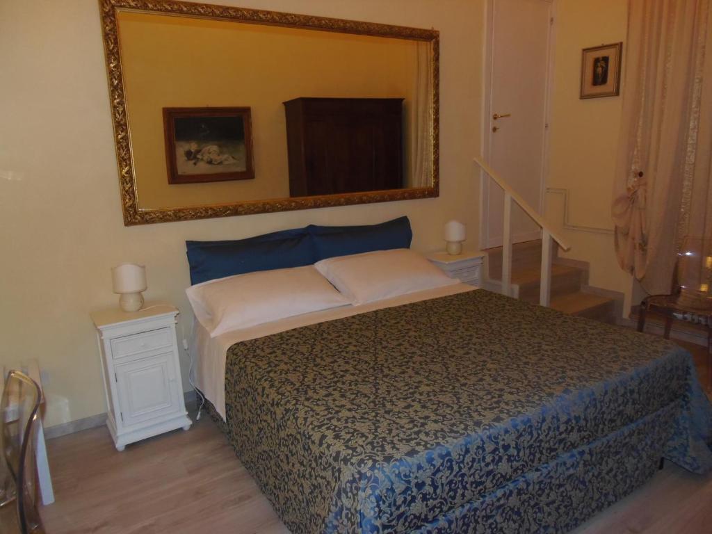 Postel nebo postele na pokoji v ubytování Hotel Morlacchi