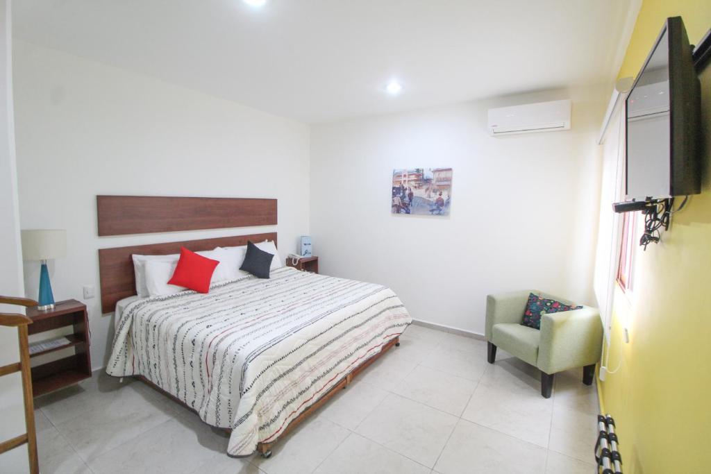 Postel nebo postele na pokoji v ubytování Casa de la iaia Hotel