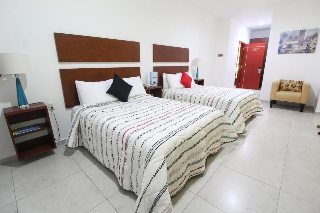 Postel nebo postele na pokoji v ubytování Casa de la iaia Hotel