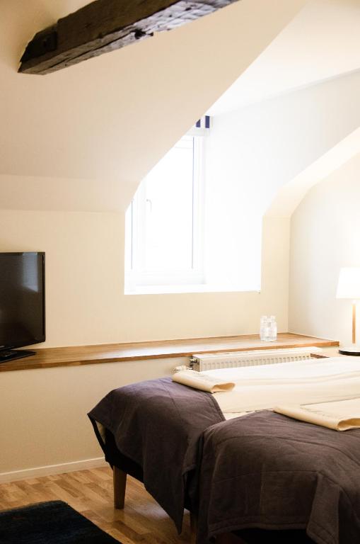 TV a/nebo společenská místnost v ubytování Hotel Vanilla