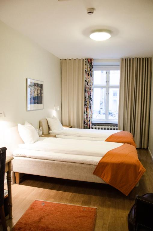 Postel nebo postele na pokoji v ubytování Hotel Vanilla