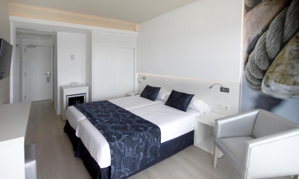 A bed or beds in a room at BG Java