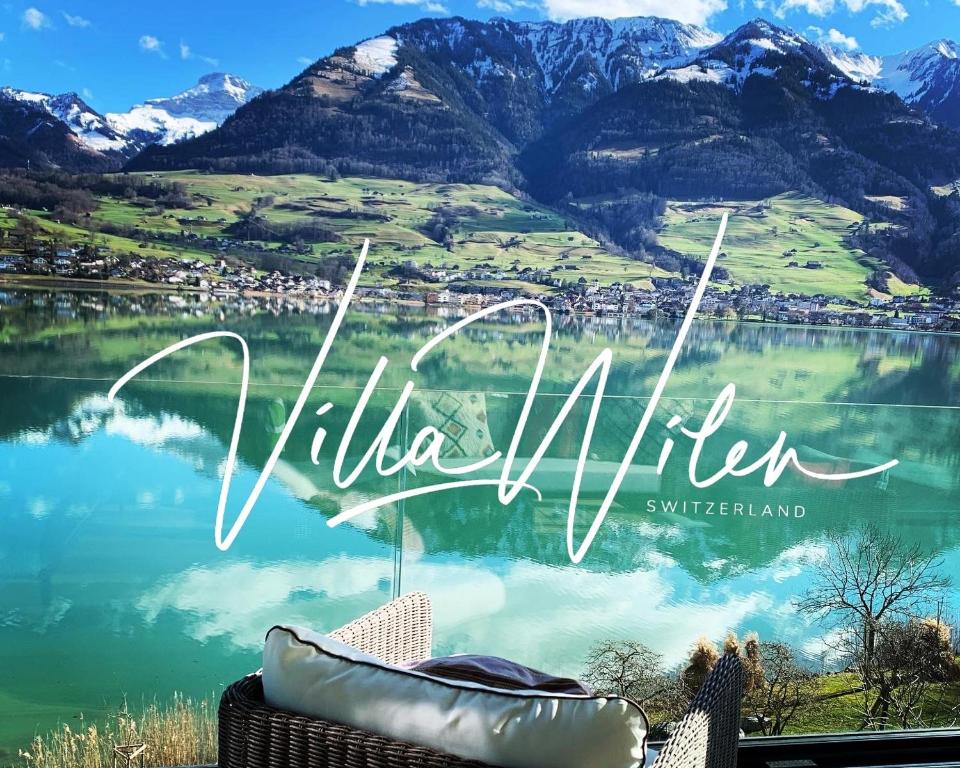 een uitzicht op het meer van Luzern in Zwitserland bij Luxury loft on top of Villa Wilen with tremendous views by the lake in Sarnen