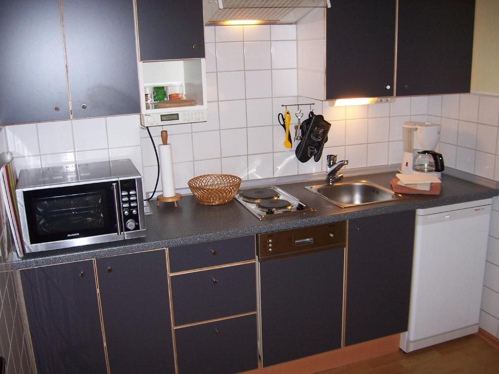 Kuchyň nebo kuchyňský kout v ubytování DARZ GästeZimmer