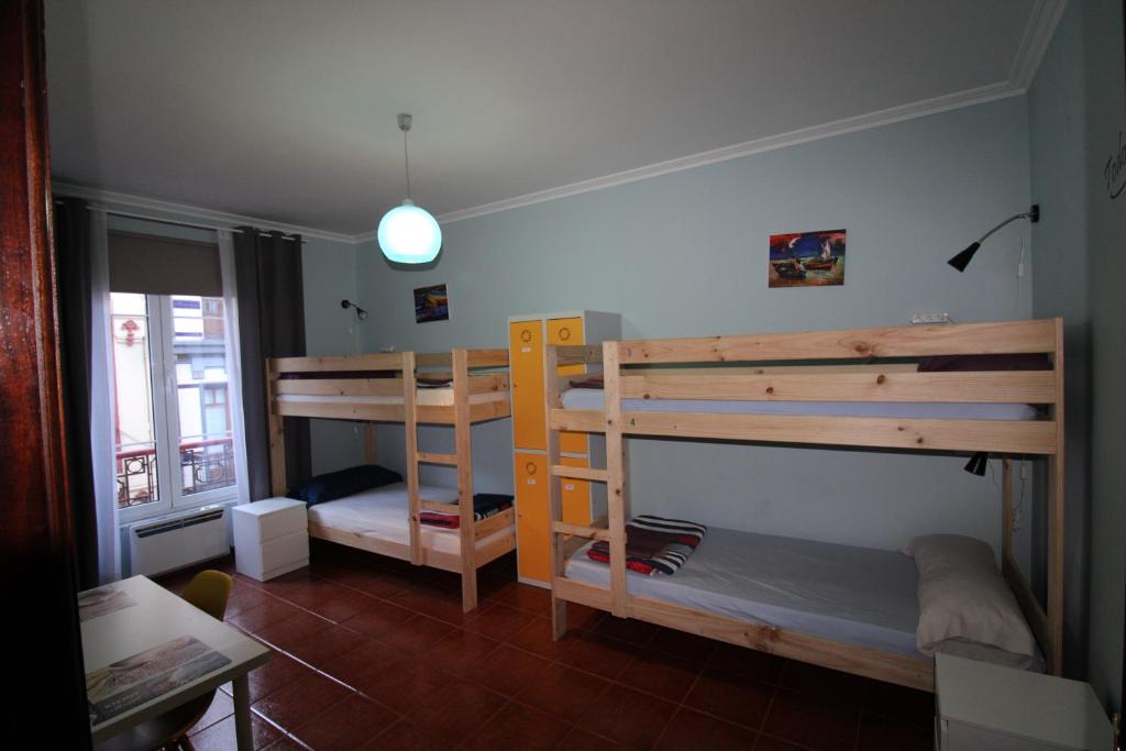 Postel nebo postele na pokoji v ubytování Hostel GoodHouse Gijón