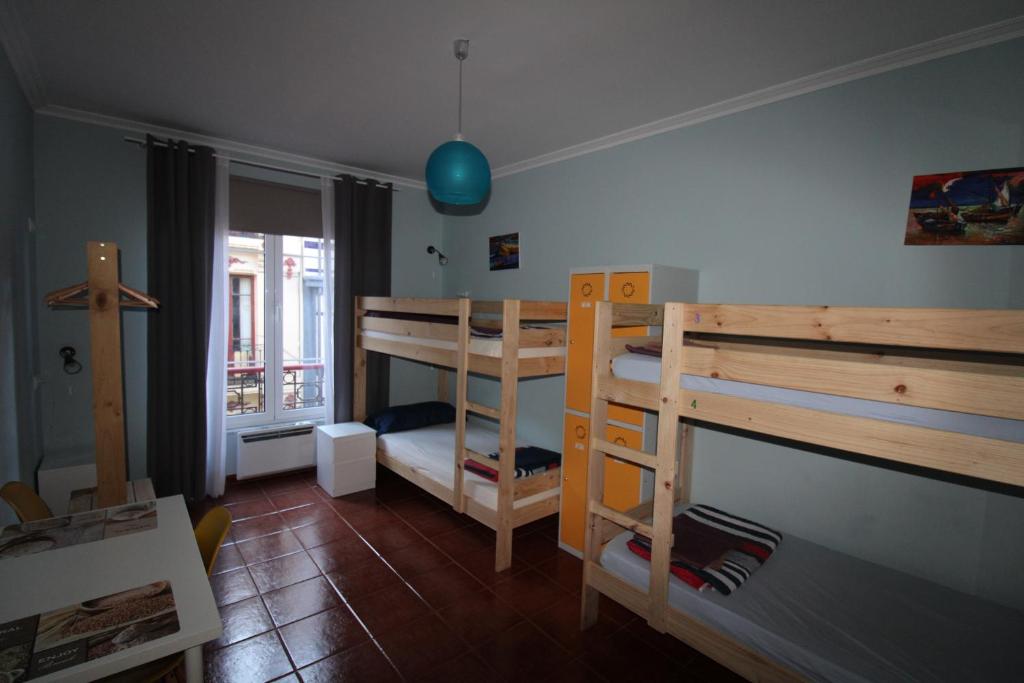 Postel nebo postele na pokoji v ubytování Hostel GoodHouse Gijón