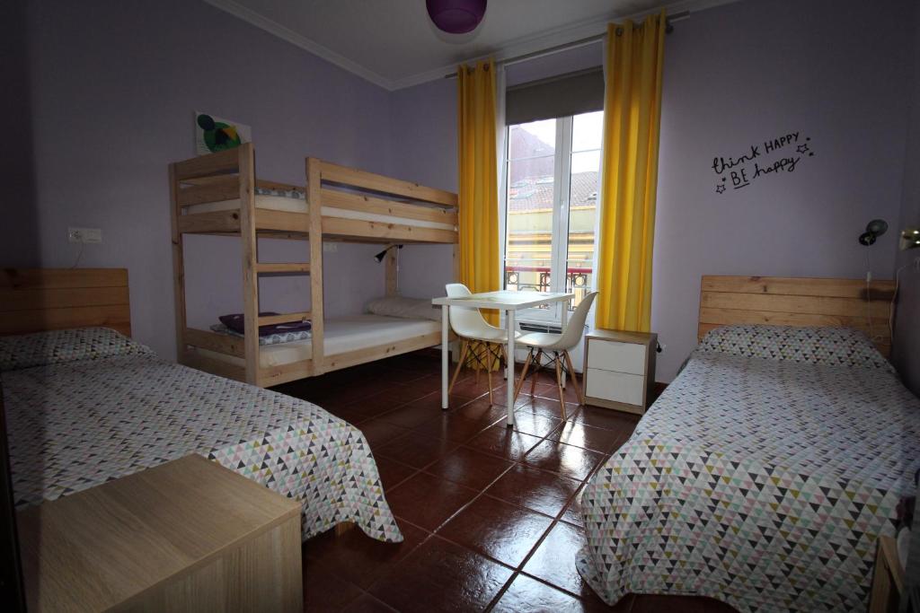 Postel nebo postele na pokoji v ubytování Hostel GoodHouse Gijón