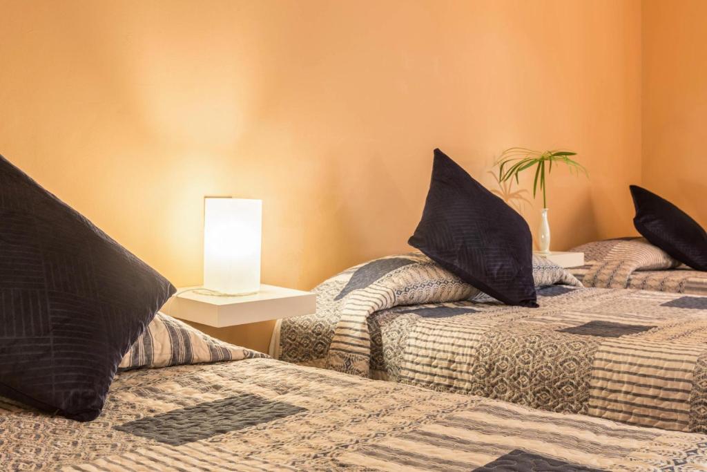 Posteľ alebo postele v izbe v ubytovaní Duplex Pedroza