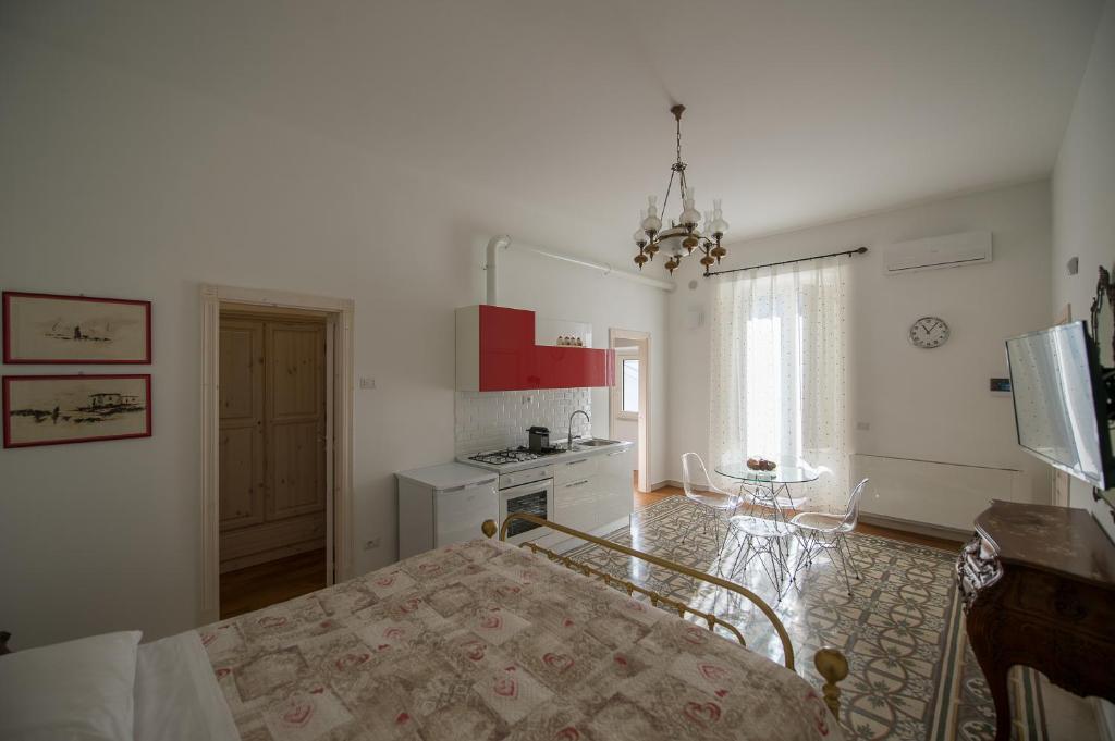 Łóżko lub łóżka w pokoju w obiekcie Ai Cappuccini Guest House