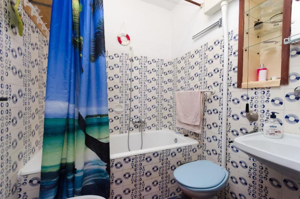 Kúpeľňa v ubytovaní Apartments and Room Luka