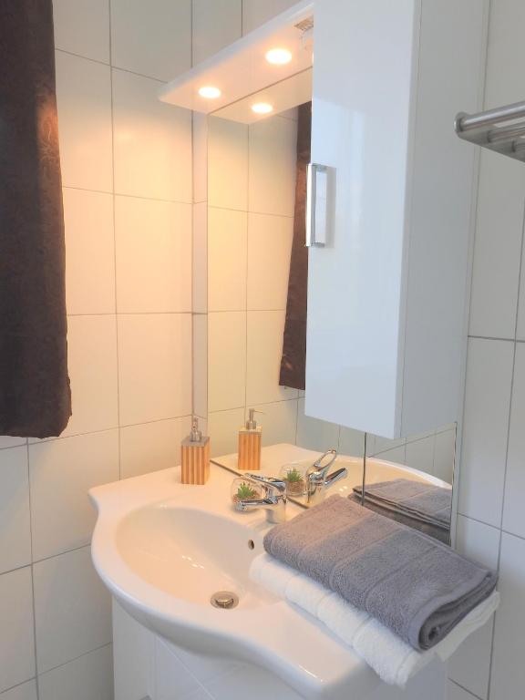 Kúpeľňa v ubytovaní Apartments CITY Stadion
