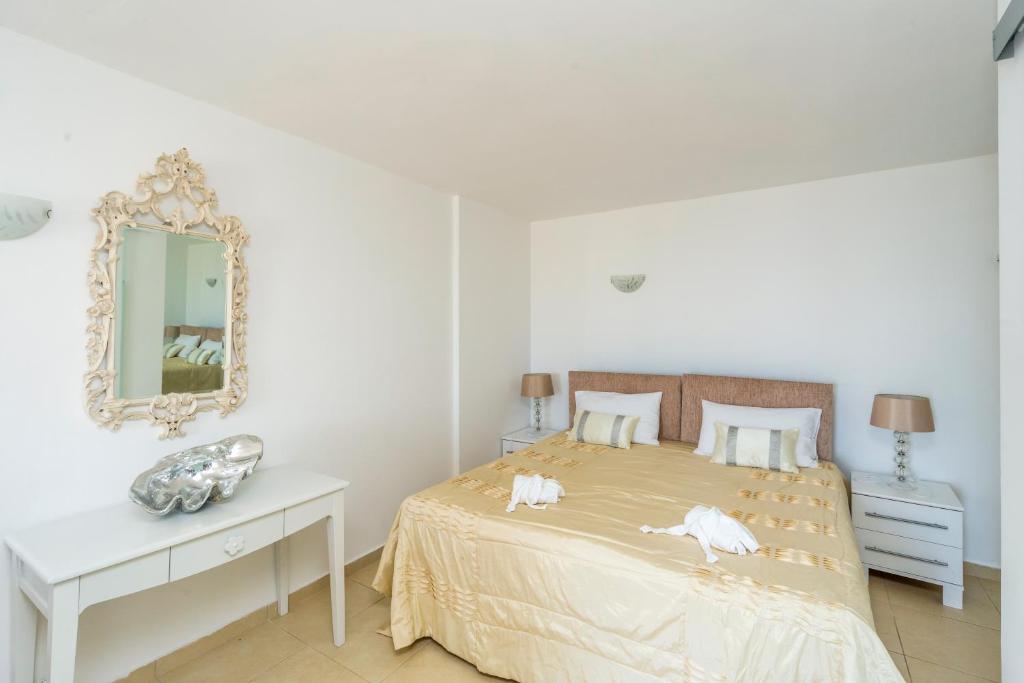 Postel nebo postele na pokoji v ubytování Spileo House Boutique Apartments - Adults Only
