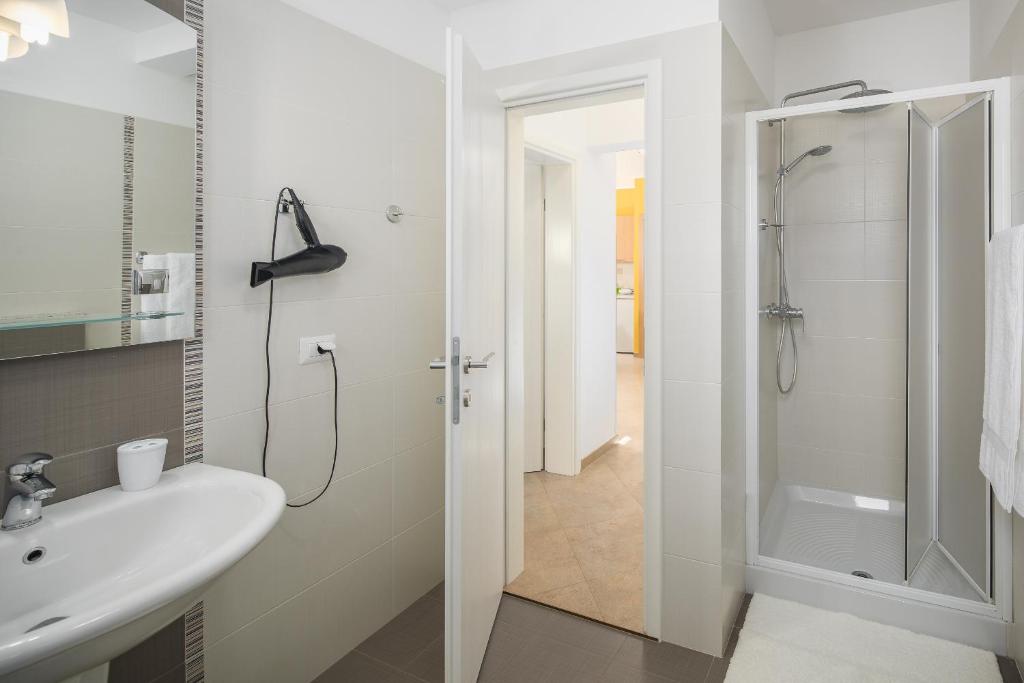 Koupelna v ubytování Apartment Gloria Premium