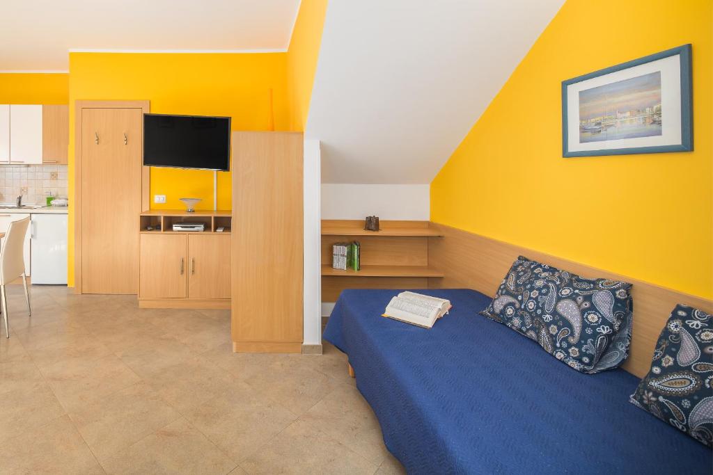 Kuchyň nebo kuchyňský kout v ubytování Apartment Gloria Premium
