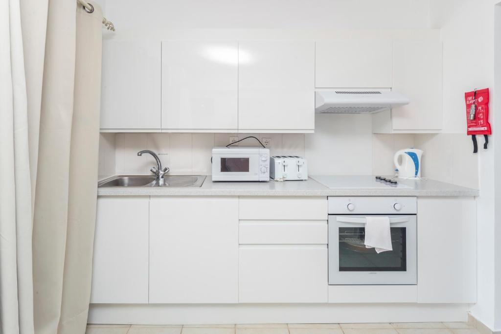 Kuchyň nebo kuchyňský kout v ubytování Spileo House Boutique Apartments - Adults Only