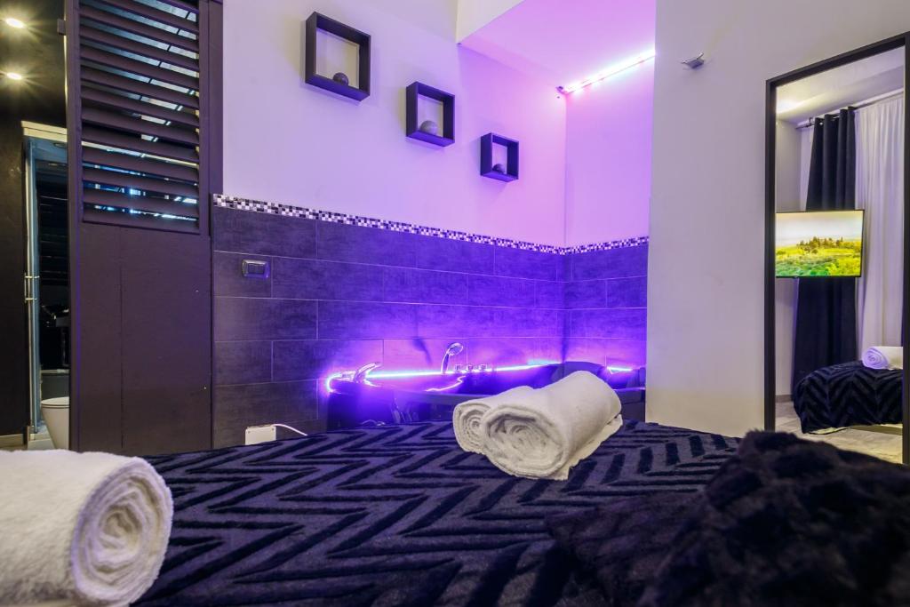 Posteľ alebo postele v izbe v ubytovaní Sicily Suite
