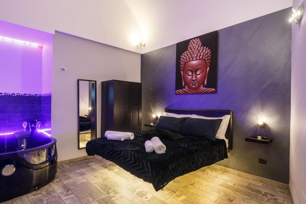 Posteľ alebo postele v izbe v ubytovaní Sicily Suite
