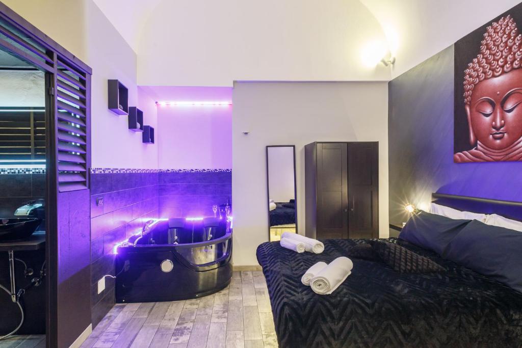 Posteľ alebo postele v izbe v ubytovaní Sicily Suite