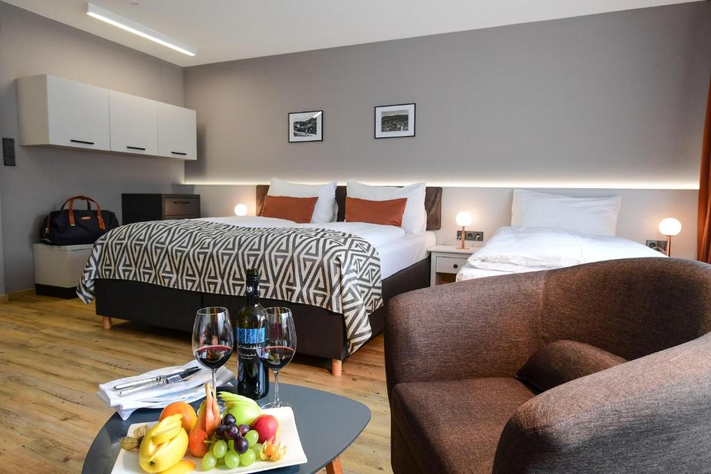 Postel nebo postele na pokoji v ubytování Hotel Alpenblick Kreischberg