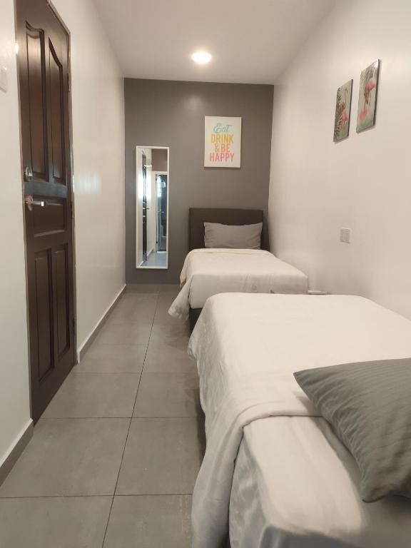 Postel nebo postele na pokoji v ubytování Just Austin Guesthouse