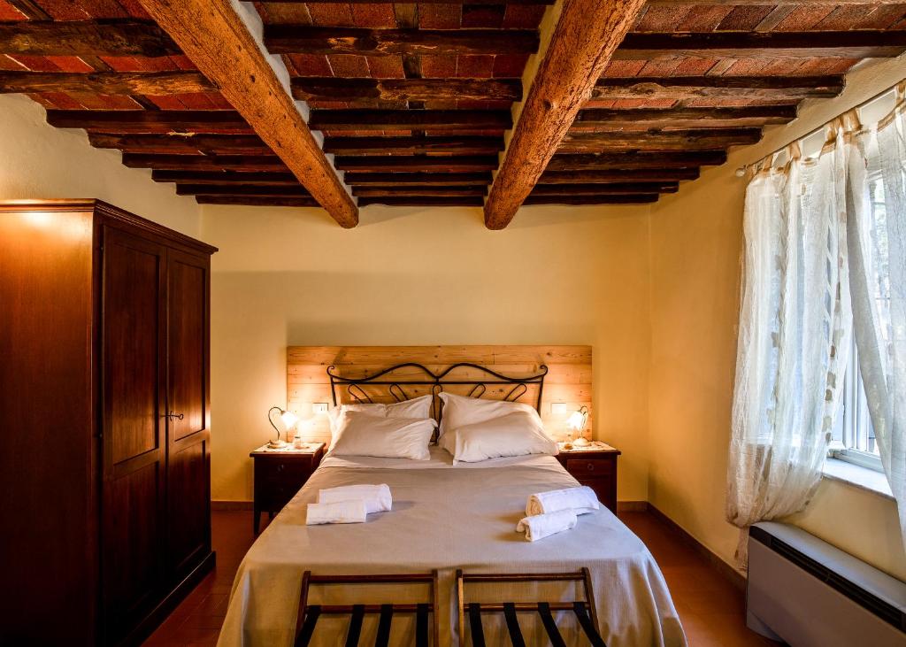 Posteľ alebo postele v izbe v ubytovaní Agriturismo Tenuta Adamo