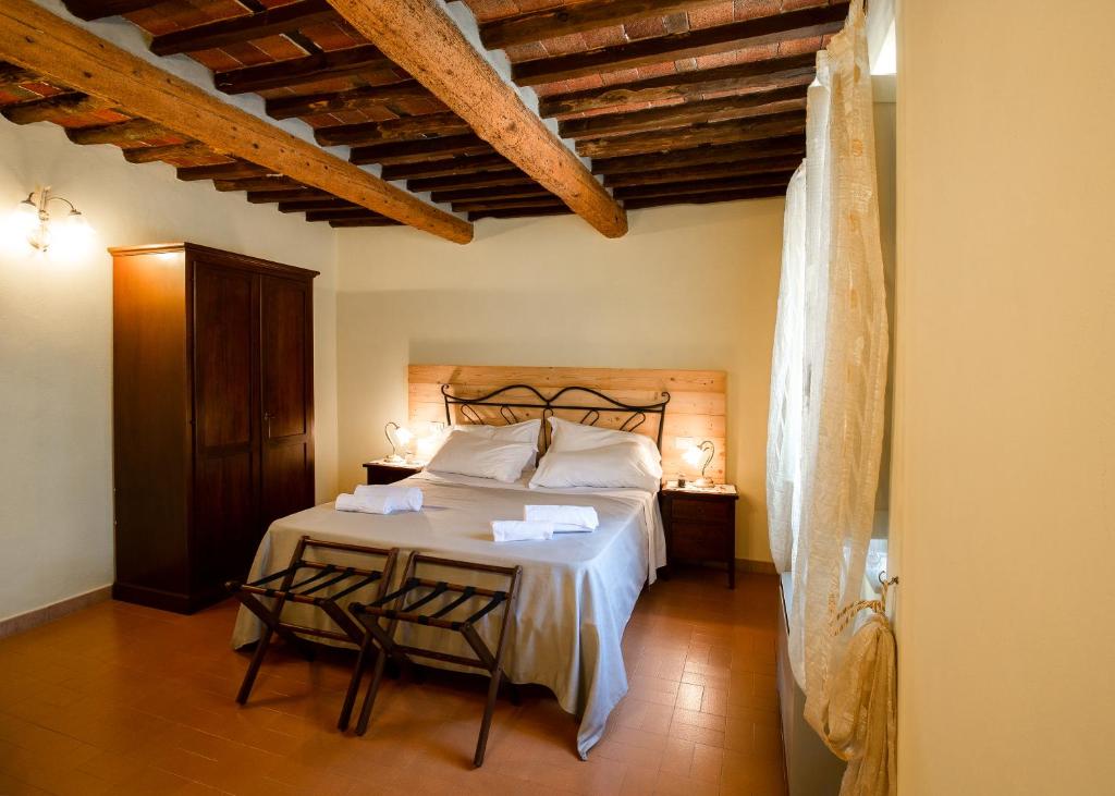 Posteľ alebo postele v izbe v ubytovaní Agriturismo Tenuta Adamo