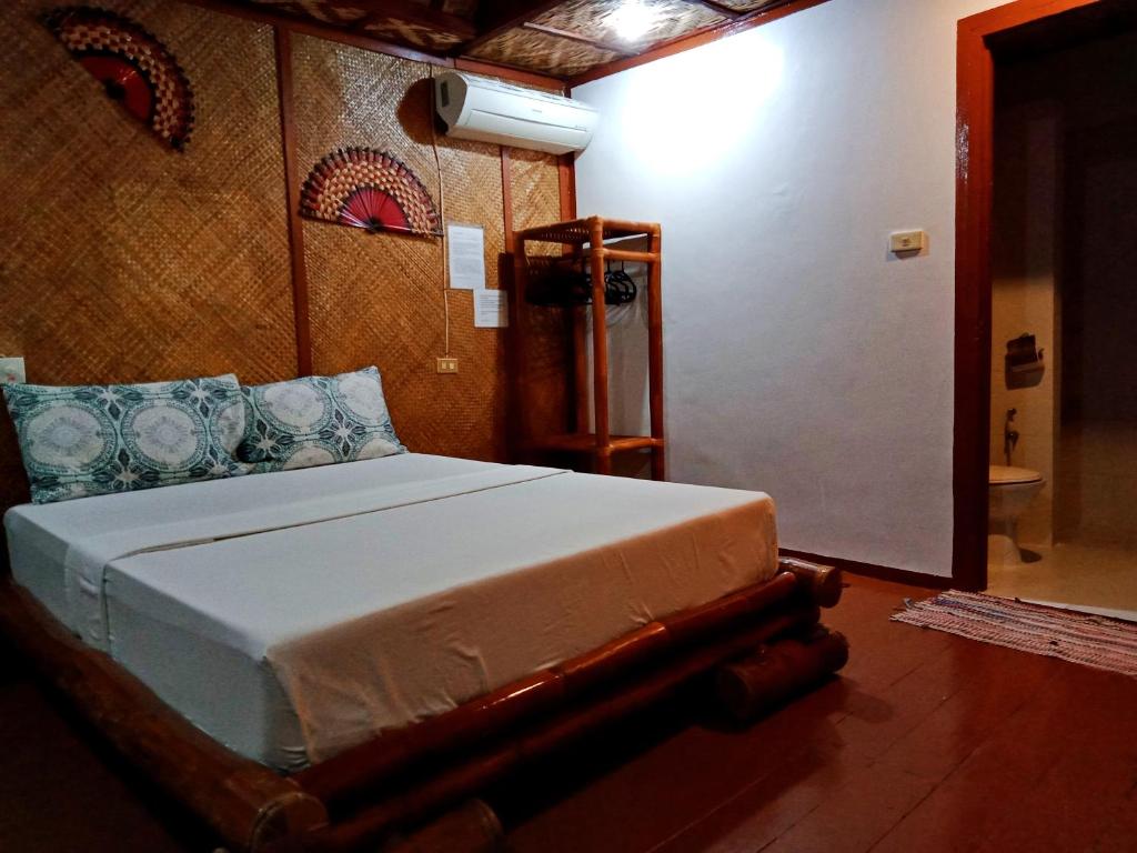 Voodi või voodid majutusasutuse Allba's Homestay toas