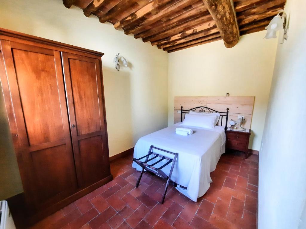 Posteľ alebo postele v izbe v ubytovaní Agriturismo Tenuta Adamo