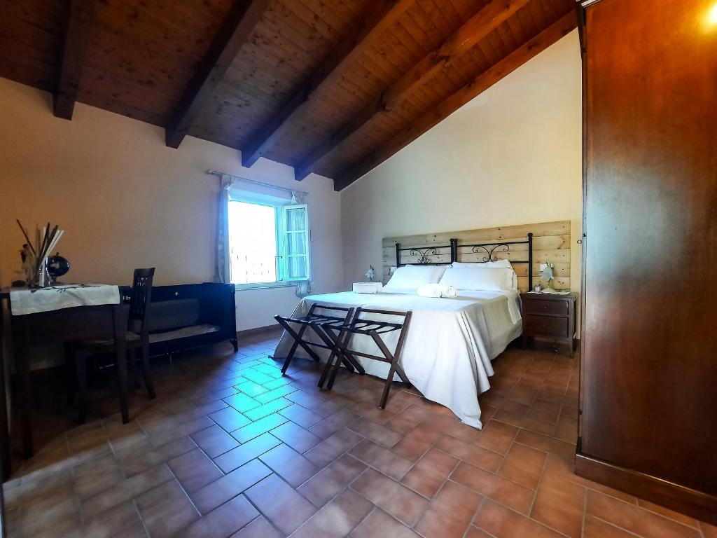 Posteľ alebo postele v izbe v ubytovaní Agriturismo Tenuta Adamo