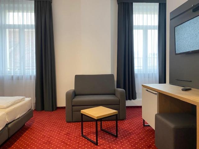 Postel nebo postele na pokoji v ubytování Hotel Continental