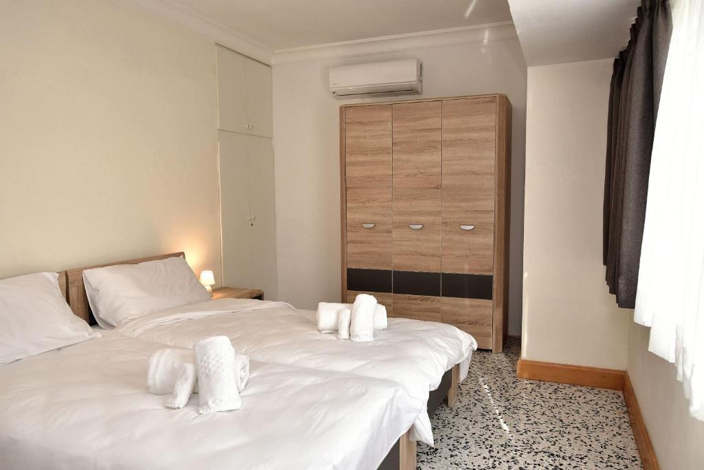 Postel nebo postele na pokoji v ubytování 2 Bedroom, Central and Spacious Apartment with Sea View - 2