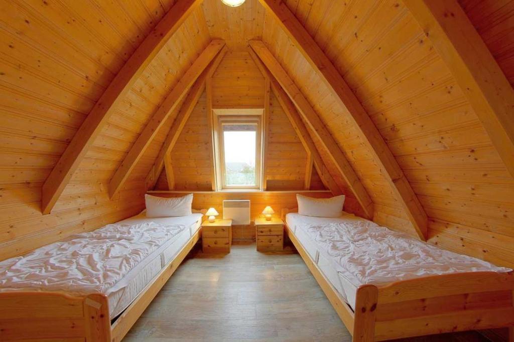 Postel nebo postele na pokoji v ubytování Strandvogt 3 KN3