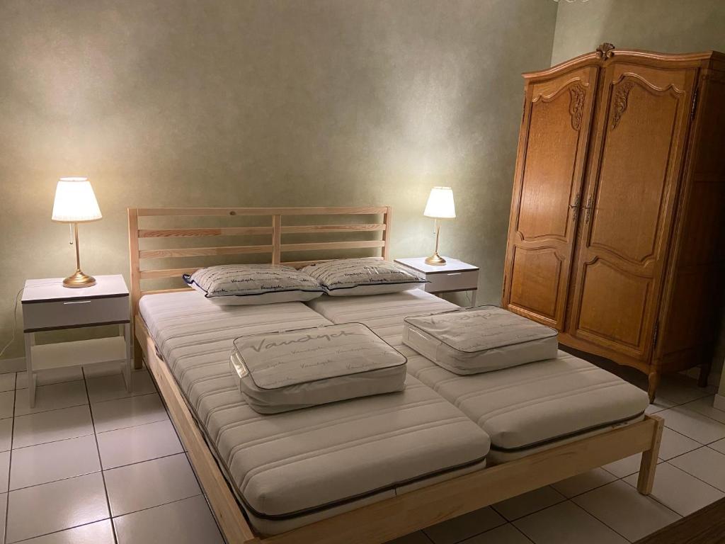 Ένα ή περισσότερα κρεβάτια σε δωμάτιο στο Vakantiewoning De Kassei Geraardsbergen max 12personen