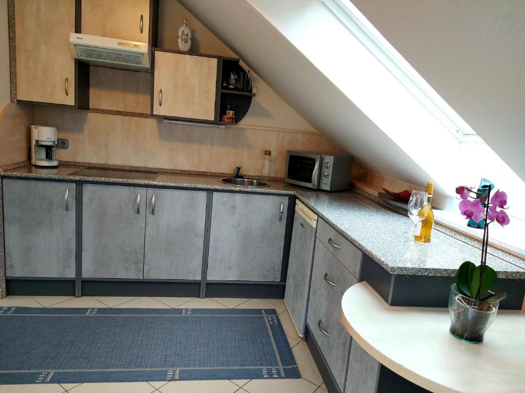 Kuchyňa alebo kuchynka v ubytovaní A Mecsek Gyöngye Apartmanhaz