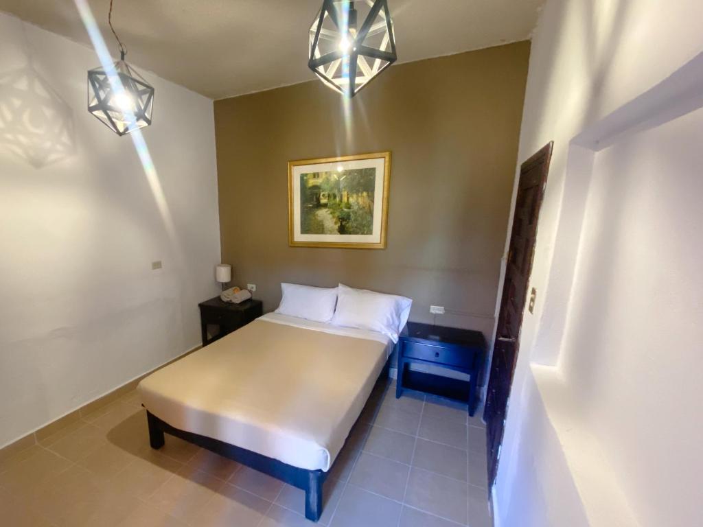 Postel nebo postele na pokoji v ubytování Hostel Inn