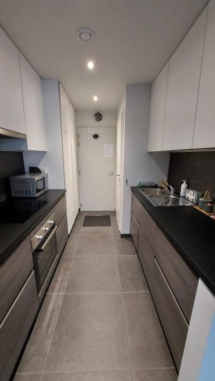مطبخ أو مطبخ صغير في Studio Belle-Vue